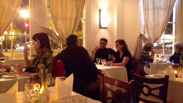 A group of people are dining at a restaurant.